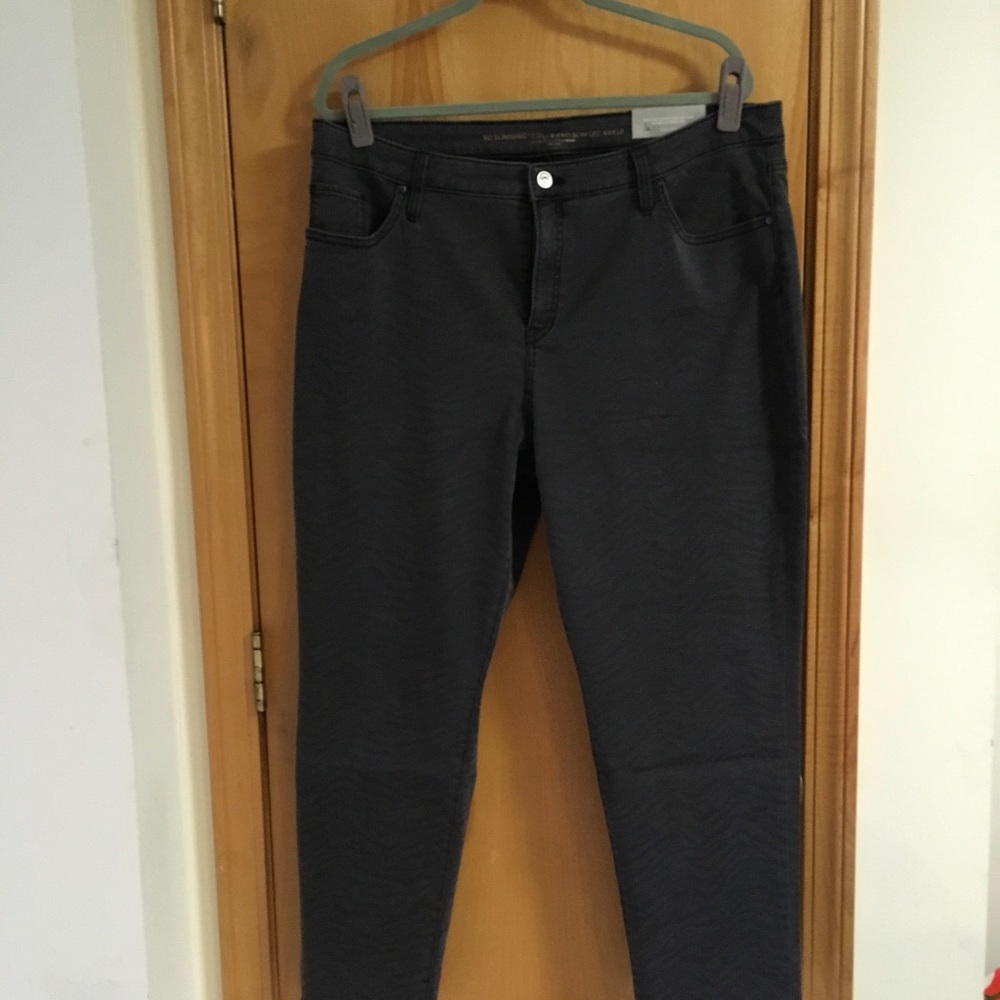 Chico’s size 3.5R (18 R) black jeans with zebra striping.